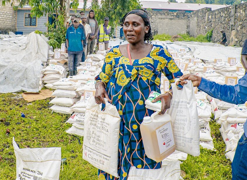 A woman receiving emergency food assistance