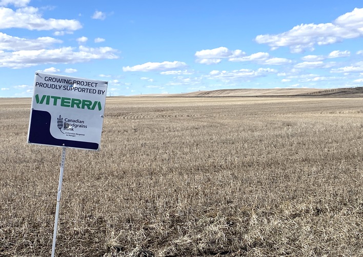 Viterra and Foodgrains Bank partnership sign in front of a Viterra field
