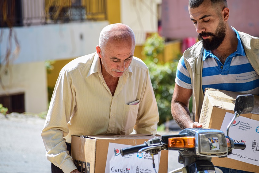 A man carrying a box