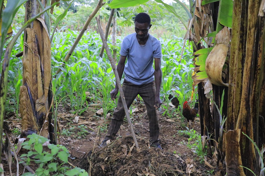 A farmer using CA practices on his farm.